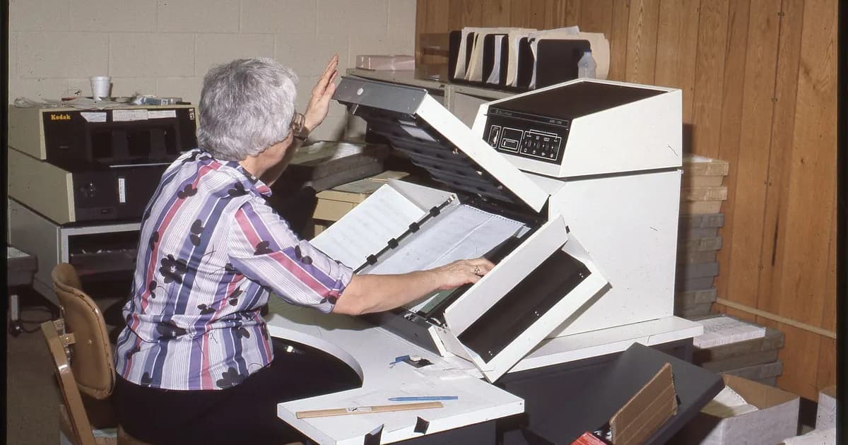 An implementation checklist being worked through on a clipboard