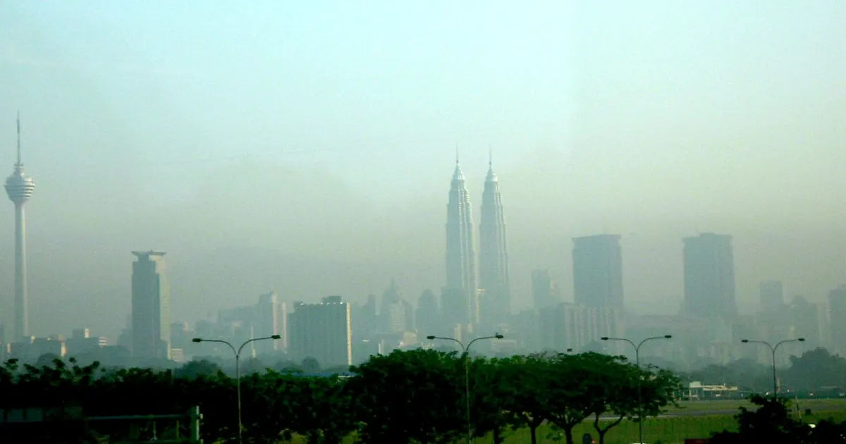 The Kuala Lumpur skyline above an active development corridor
